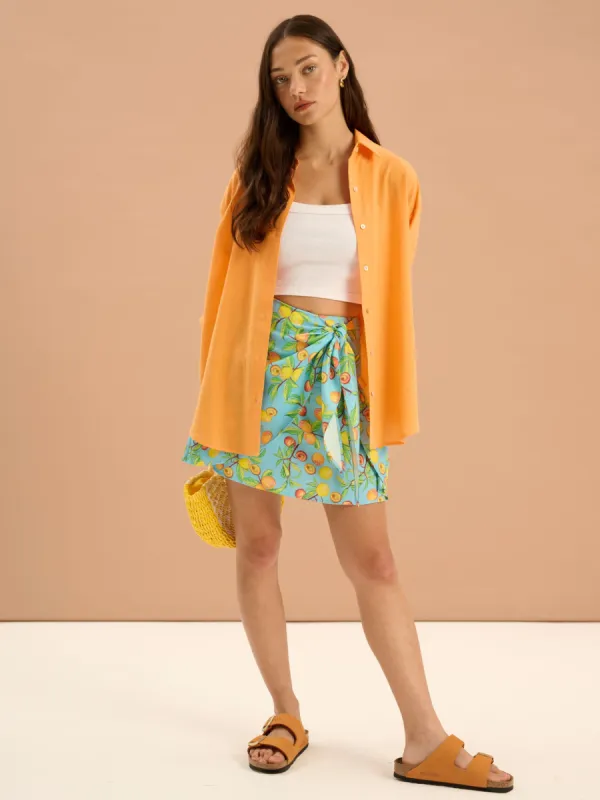 Percy Twill Frill Fruit Print Wrap Front Skirt sold by Omnes