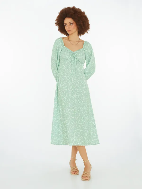 Kylie Midi Dress in Green Heart Print sold by Omnes