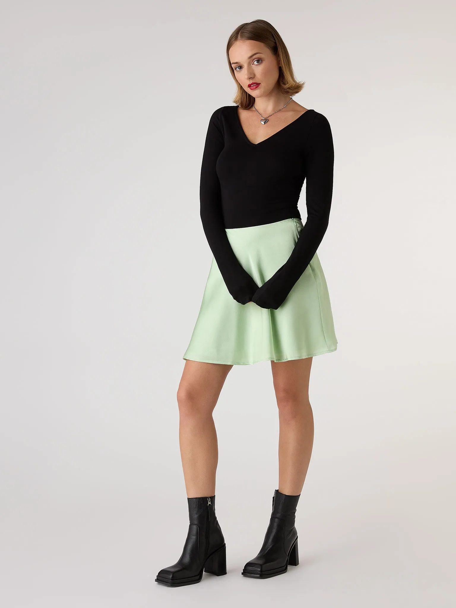 Jeanne Mini Satin Skirt in Green sold by Omnes product image thumbnail 2