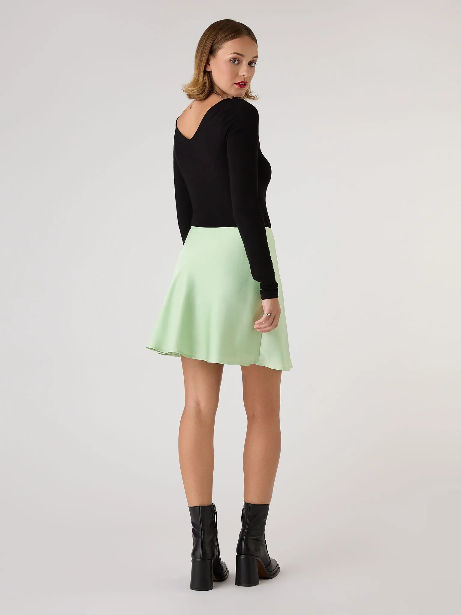 Jeanne Mini Satin Skirt in Green sold by Omnes product image thumbnail 3