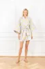 bouquet brocade mini wrap dress sold by Larroude