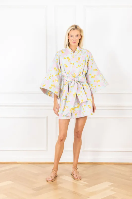 bouquet brocade mini wrap dress sold by Larroude