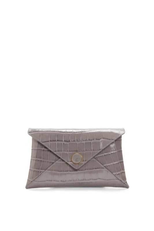 Medallion' Envelope Clutch sold by Larroude