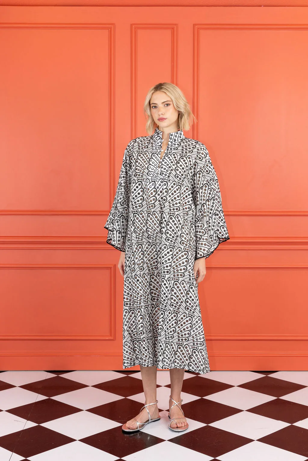 wavy eyelet maxi caftan sold by Larroude