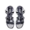 Hana Flat In Navy Patent Leather sold by Larroude