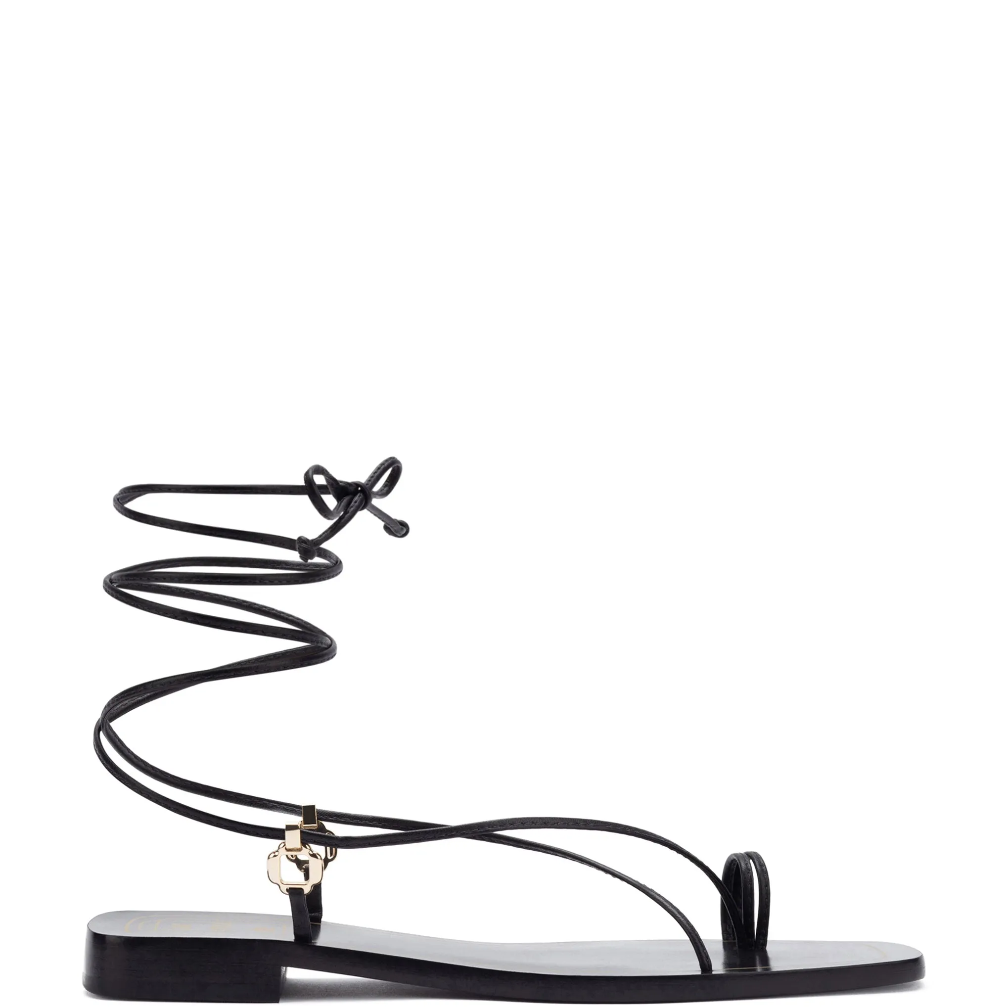 Portofino Flat Sandal In Black Leather sold by Larroude