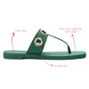 Milan S In Emerald PVC sold by Larroude