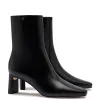 Alexis Bootie In Black Leather sold by Larroude