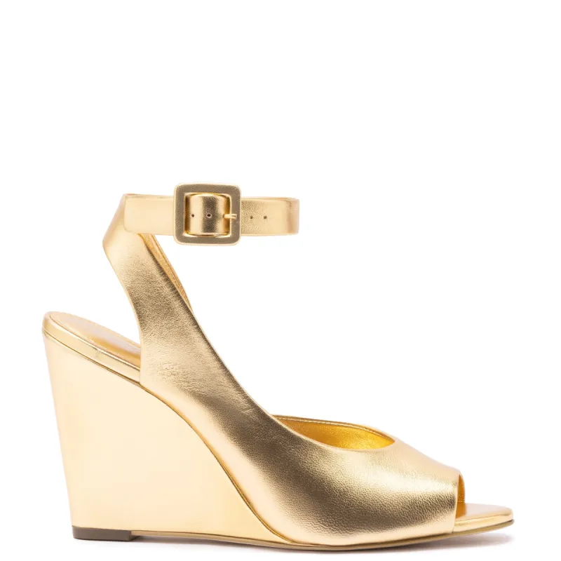 Deena By Larroudé Wedge Sandal In Gold Metallic Leather sold by Larroude