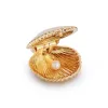 Venus Locket sold by Larroude