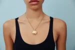 Venus Locket sold by Larroude