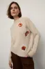 Lady Leaves Sweater sold by Larroude