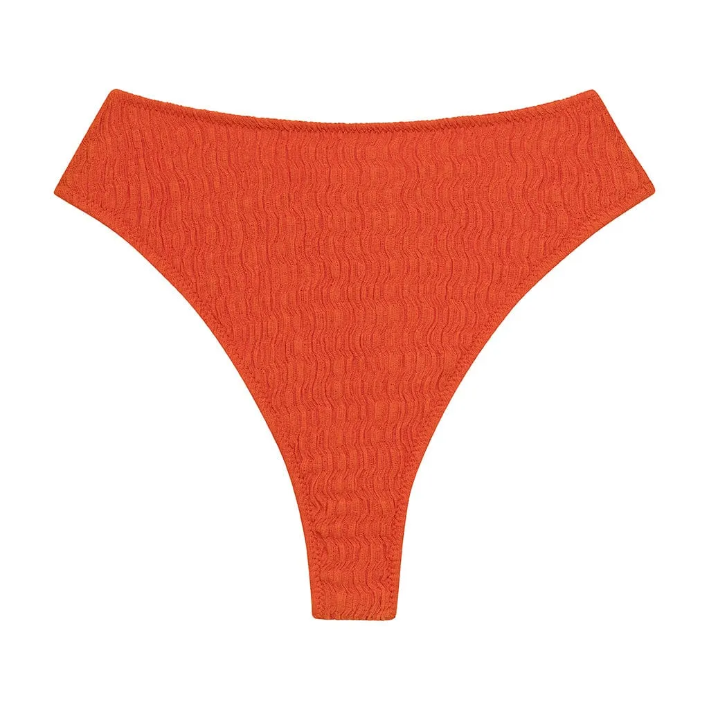 Tangerine Paula Bikini Bottom sold by Larroude