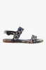 Florence Broderie Flat Sandal In Tie Dye Beige and Navy Raffia sold by Larroude