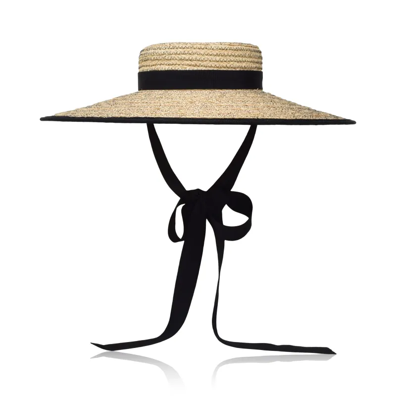 Claiborne | Natural & Black sold by Larroude