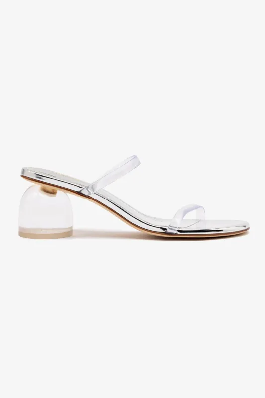 Dew Drop Mule In Silver Specchio and Vinyl sold by Larroude