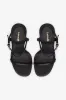 Venus Sandal In Black Leather sold by Larroude