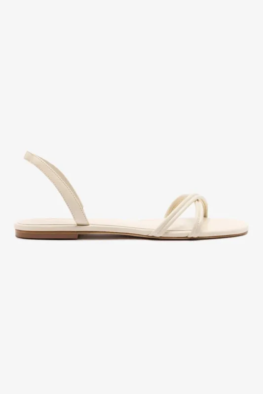 Annie Flat In Ivory Leather sold by Larroude