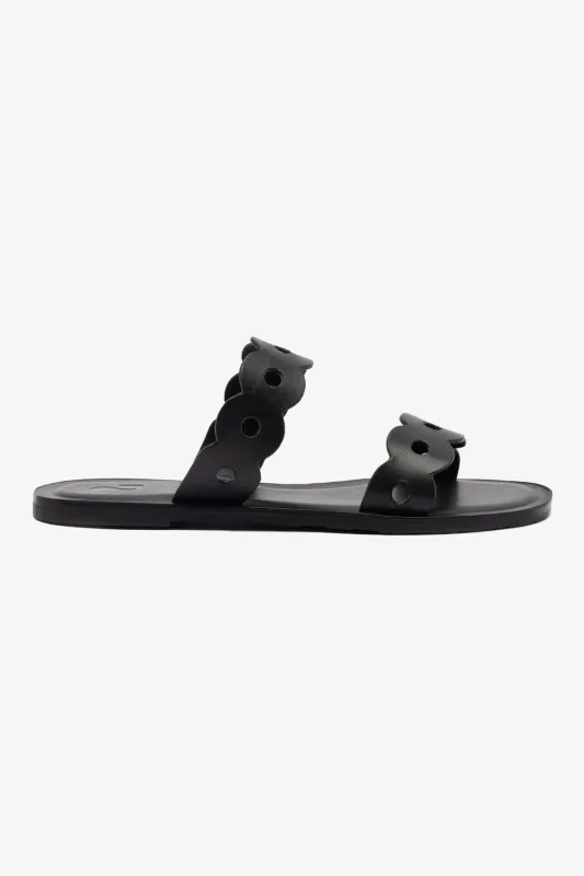 Florence Flat Mule In Black Leather sold by Larroude