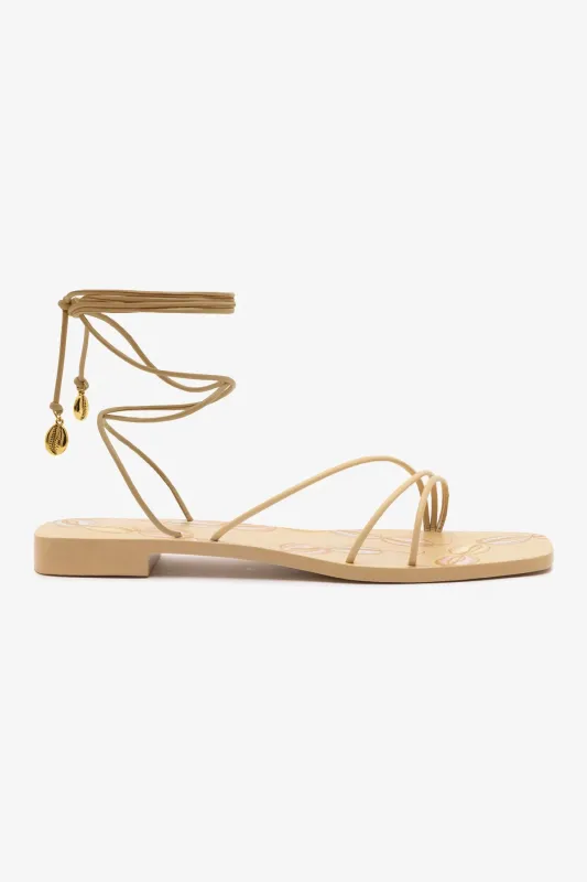 Nadia Flat Sandal In Beige Leather sold by Larroude