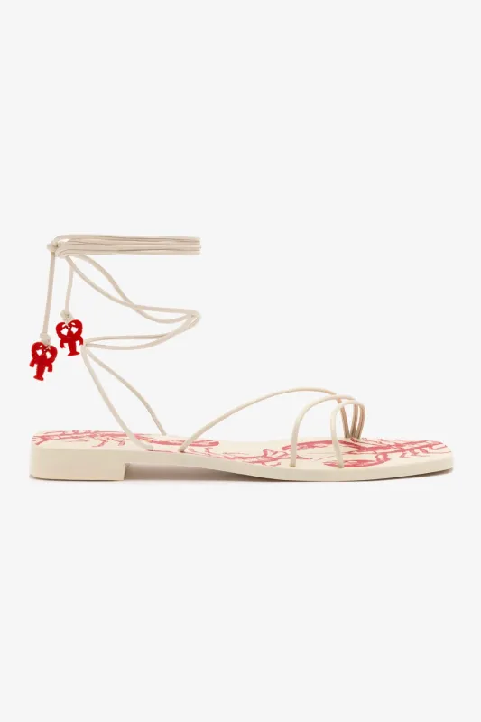 Nadia Flat Sandal In Ivory Leather sold by Larroude