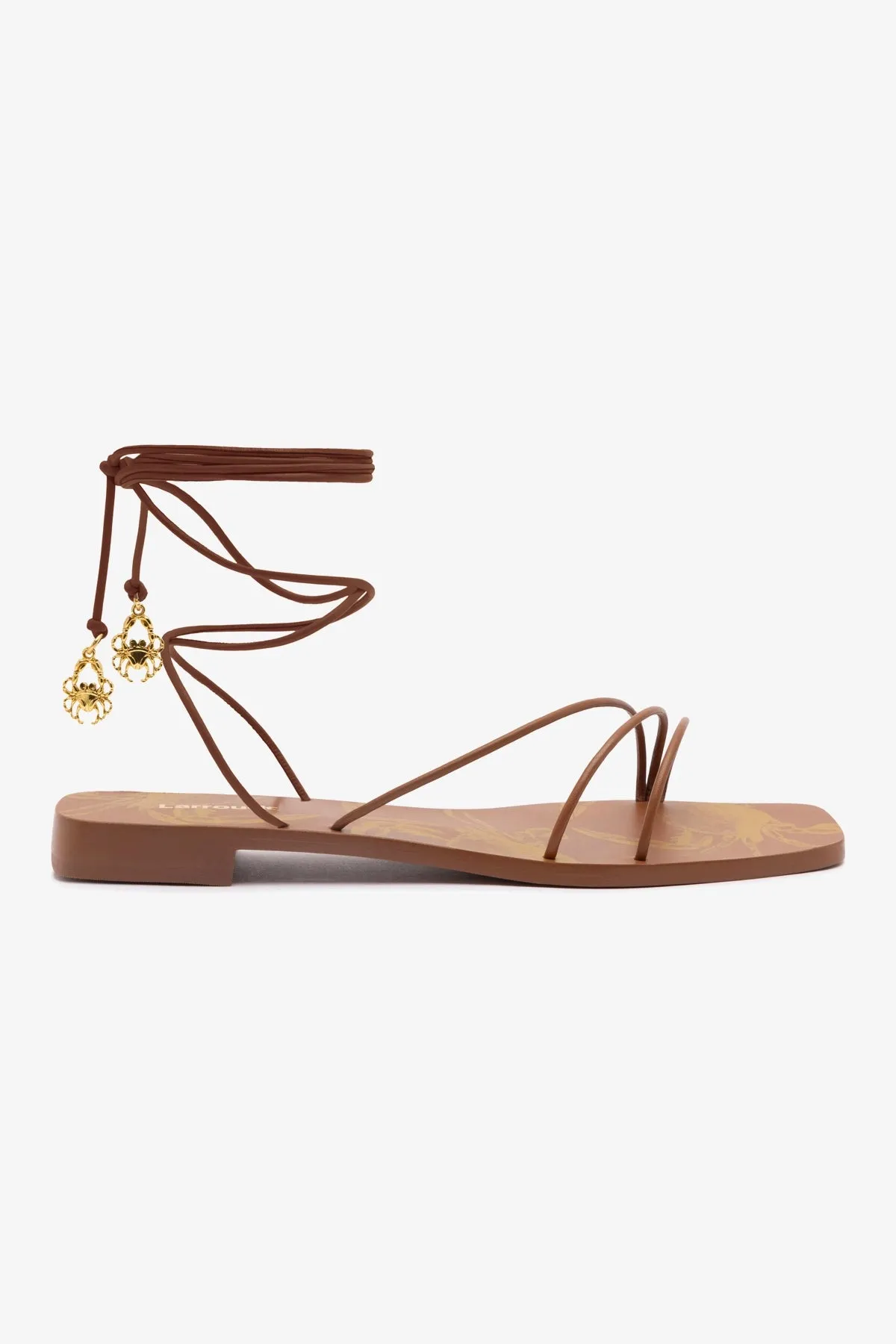 Nadia Flat Sandal In Caramel Leather sold by Larroude