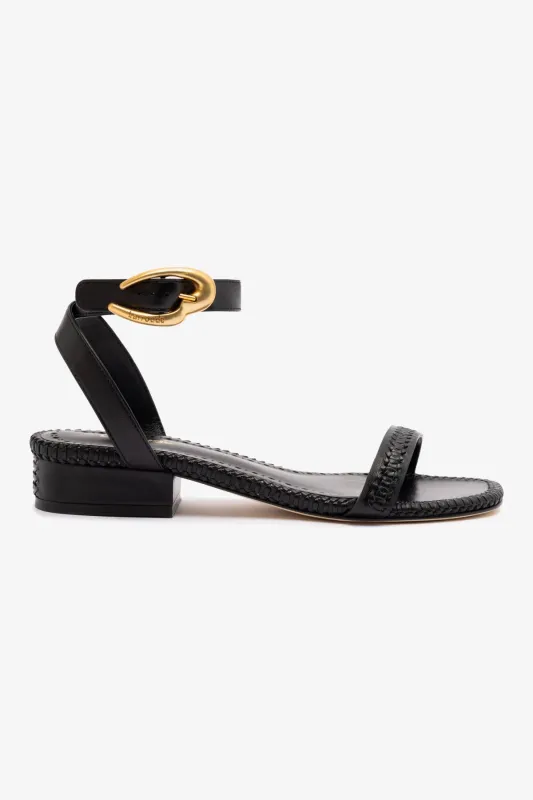 Verona Flat Sandal In Black Leather sold by Larroude