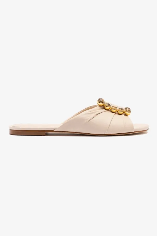Chloe Gosselin by Larroudé Nova Flat In Puff Cream Leather sold by Larroude