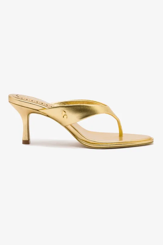 Gaia Sandal In Gold Metallic Leather sold by Larroude