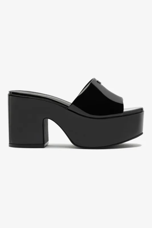 Miso Platform Mule In Black Patent Leather sold by Larroude