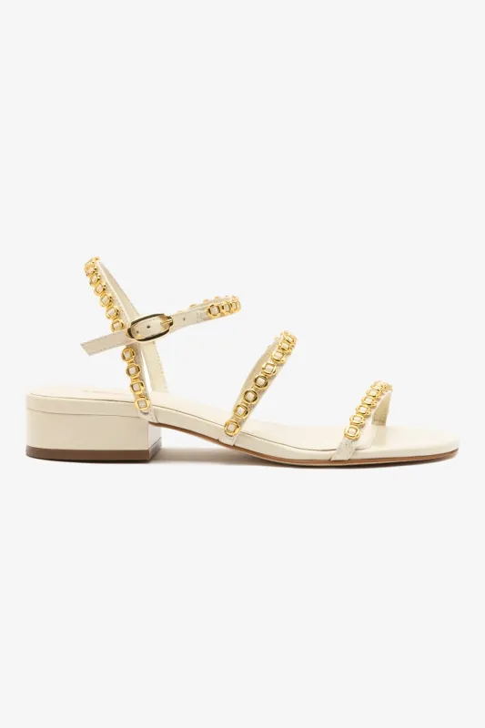 Milanina Flat Sandal In Ivory Leather sold by Larroude