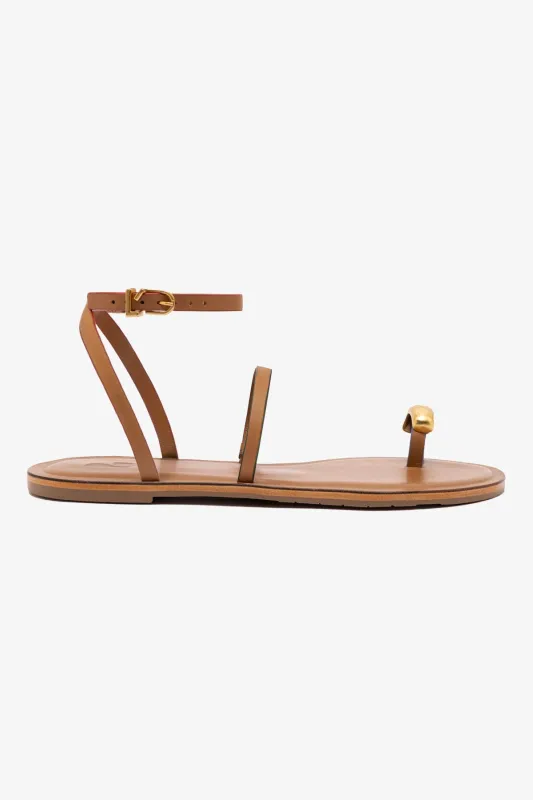 Biarritz Flat Sandal In Light Caramel Leather sold by Larroude
