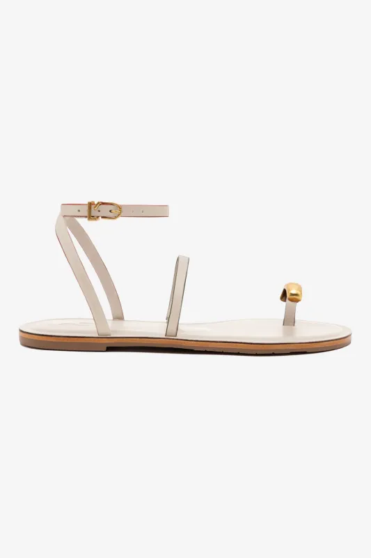 Biarritz Flat Sandal In Ivory Leather sold by Larroude