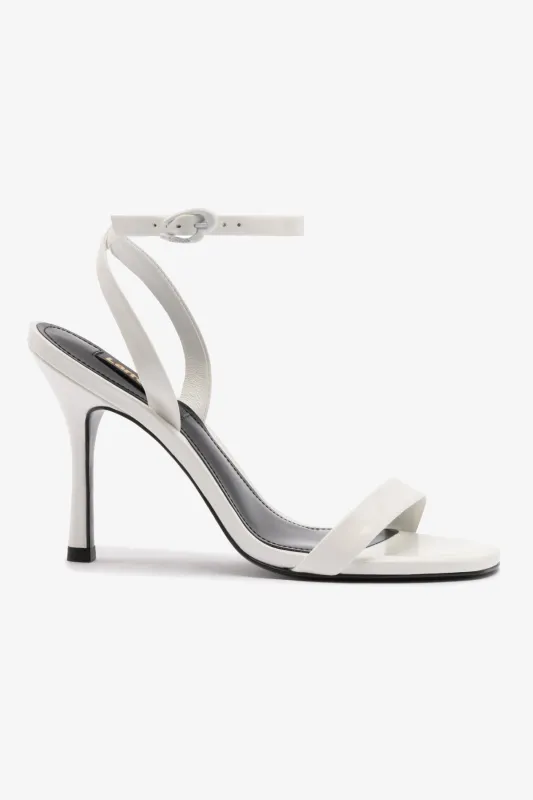 Veronina Sandal In White Patent Leather sold by Larroude