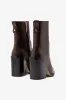 James Bootie In Brown Leather sold by Larroude