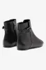 Mini Verona Boot In Black Leather sold by Larroude