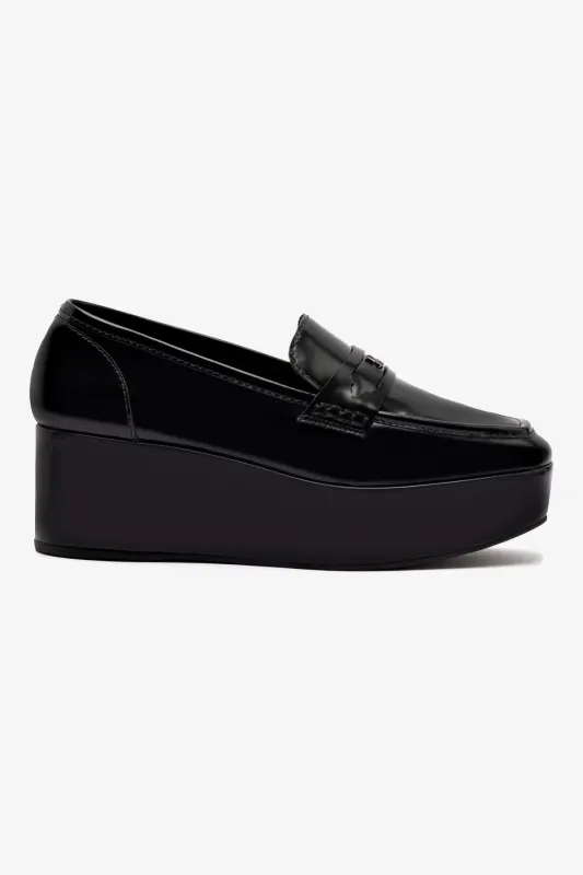 Suki Flatform Loafer In Black Box Leather sold by Larroude