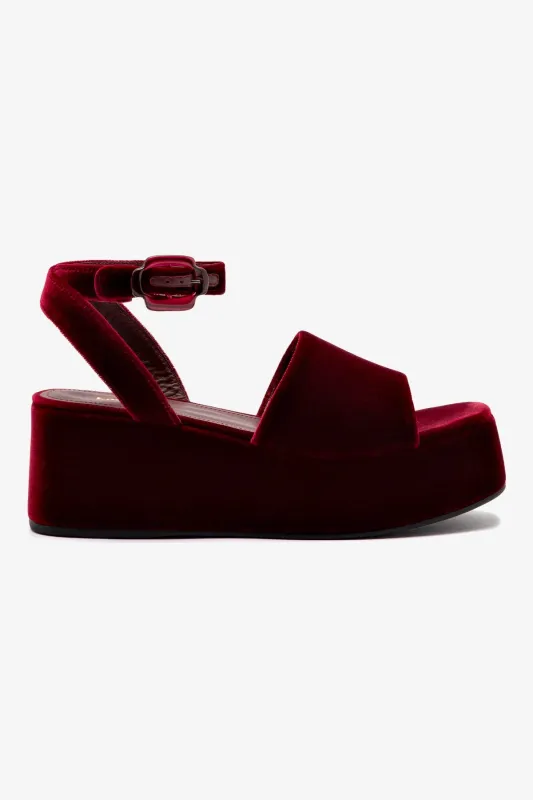 Charli Flatform Sandal In Wine Velvet sold by Larroude