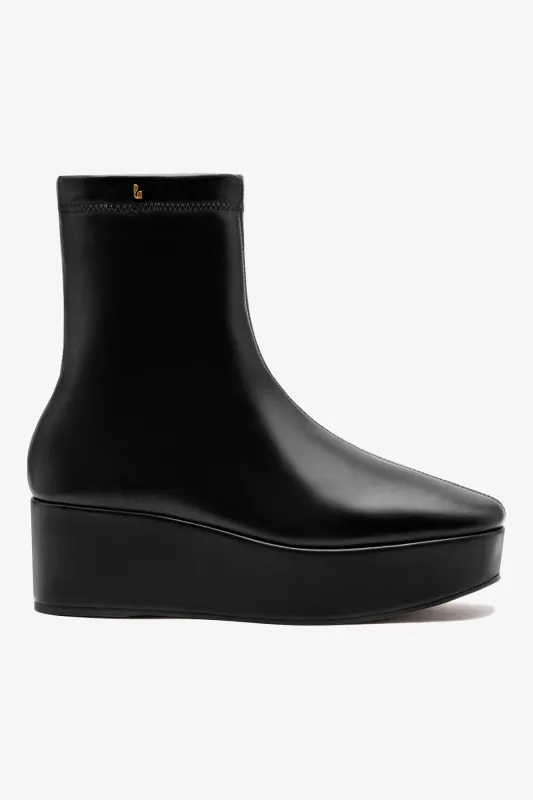 Dani Flatform Boot In Black Leather sold by Larroude