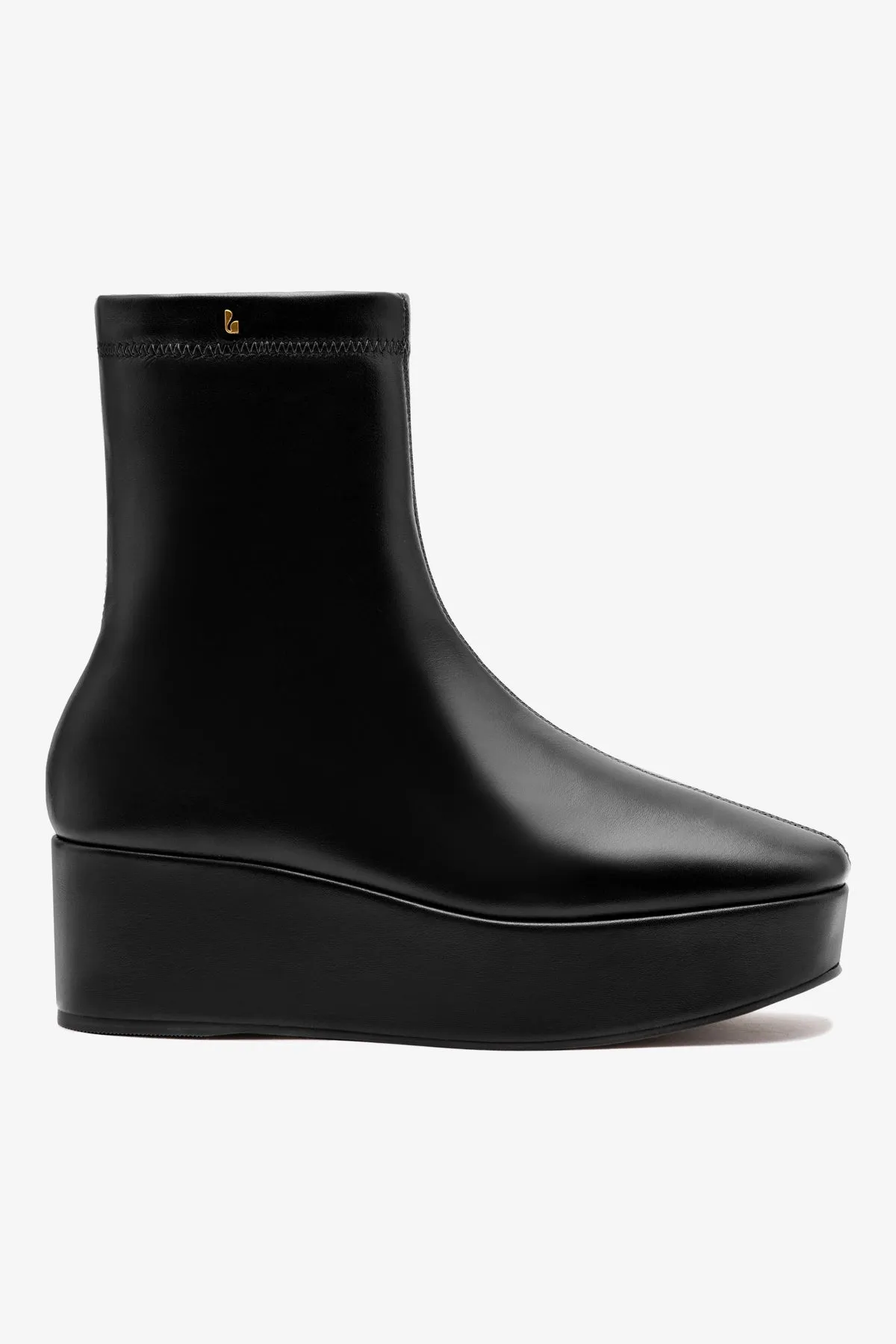 Dani Flatform Boot In Black Leather sold by Larroude