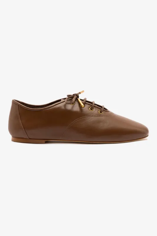 Liza Sneaker In Burnt Umber Leather sold by Larroude