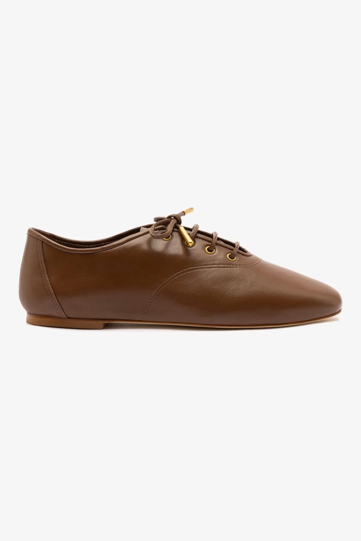 Liza Sneaker In Burnt Umber Leather sold by Larroude