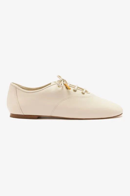 Liza Sneaker In Ivory Leather sold by Larroude