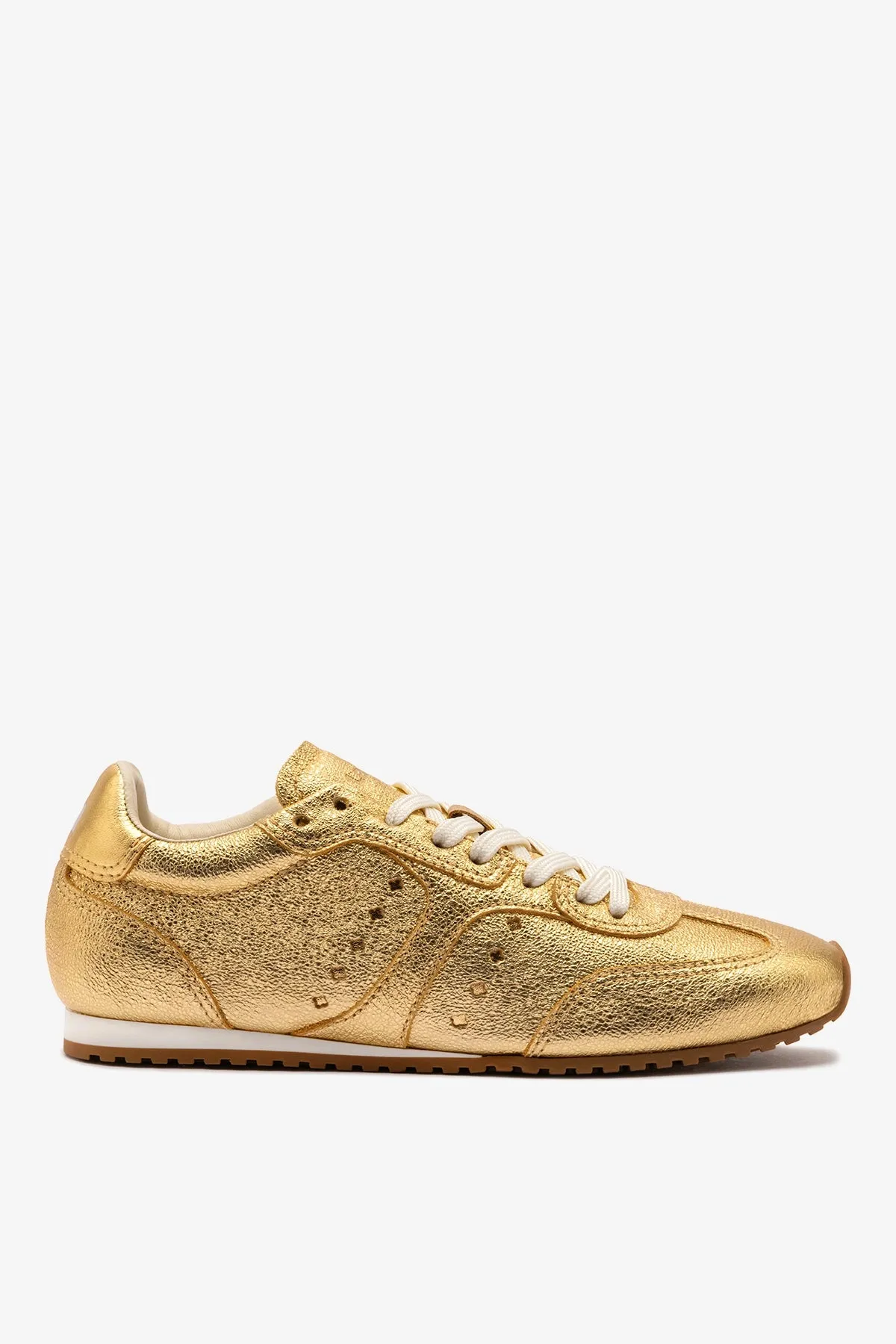 Stella Sneaker In Gold Metallic Leather sold by Larroude