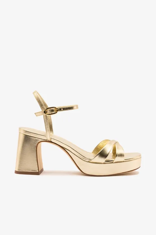 Bianca Low Sandal In Platina Metallic Leather sold by Larroude