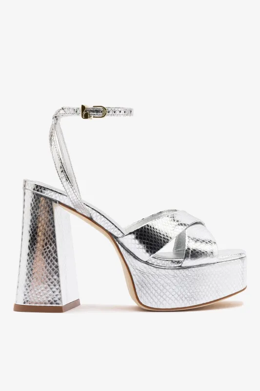 Dolly X Platform Sandal In Silver Snake Leather sold by Larroude