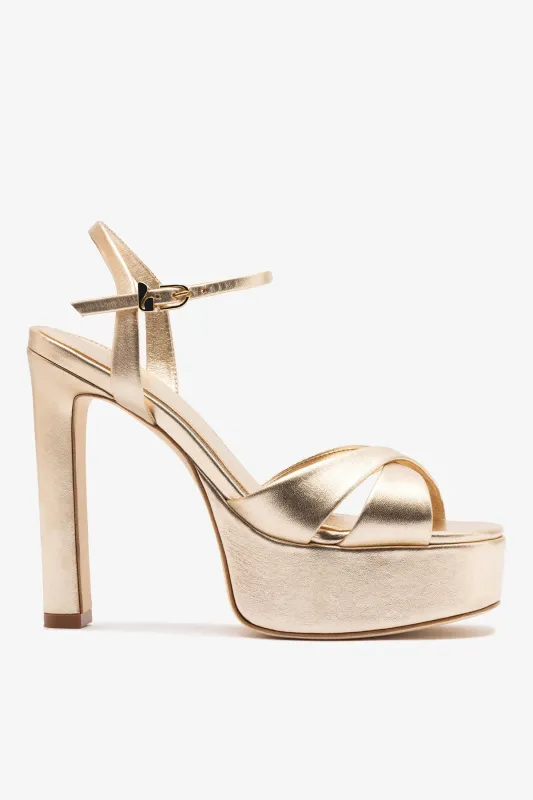Bianca High Platform Sandal In Platina Metallic Leather sold by Larroude