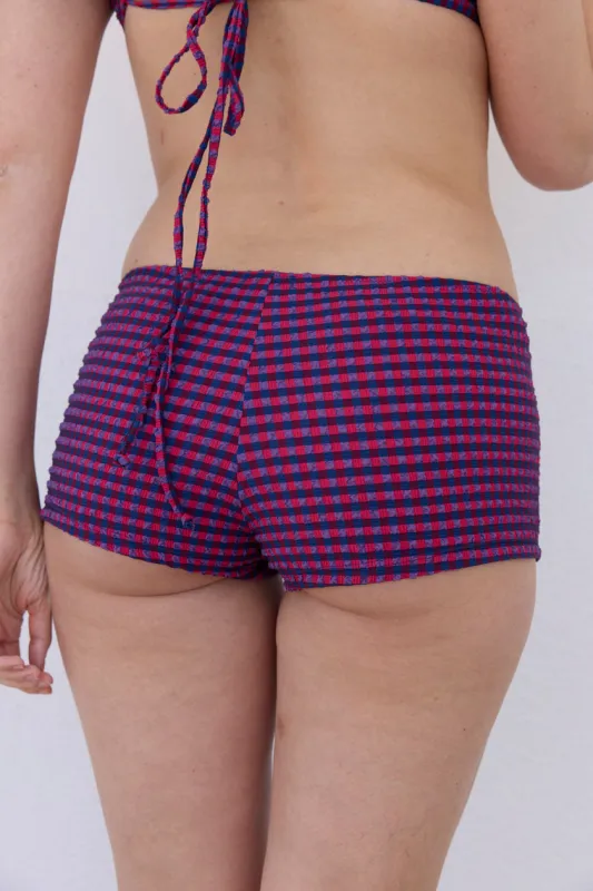 Radicchio Swim Shortie sold by Fruity Booty