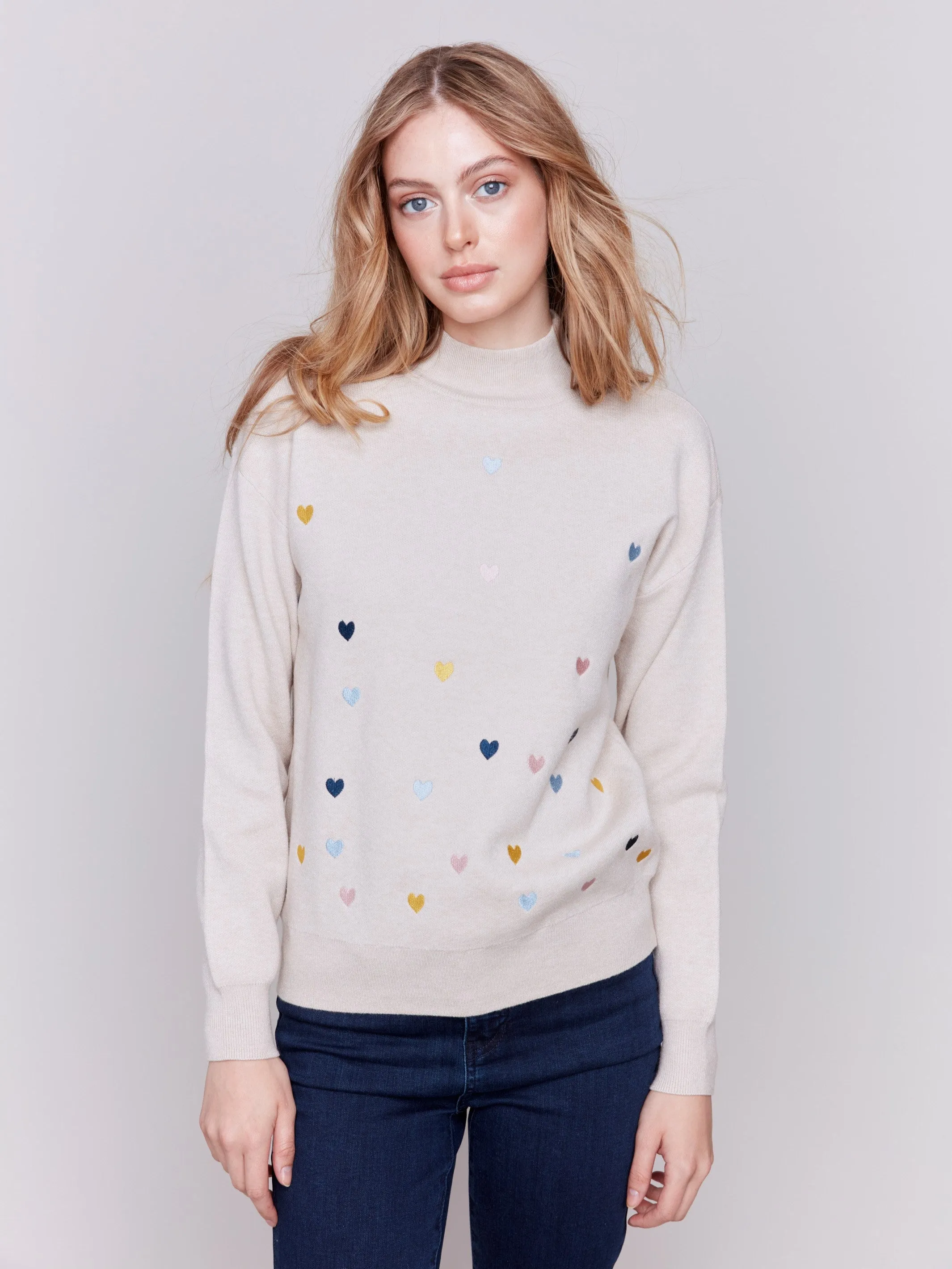 Mock Neck Sweater with Embroidered Hearts - Ecru sold by Charlie B