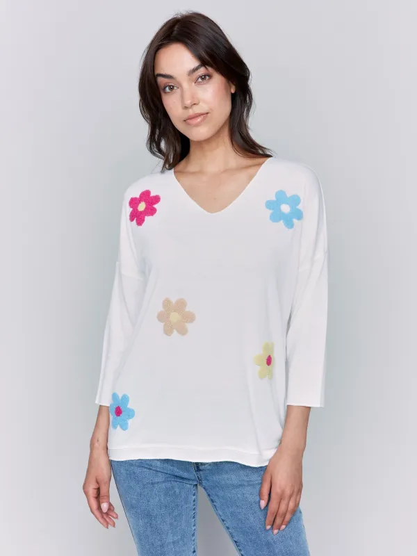 V-Neck Knit Top With Flower Appliqué - Multicolor sold by Charlie B
